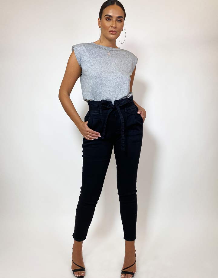 Sydne Style shows how to wear denim paperbag waist pants for spring fashion  trends  Sydne Style
